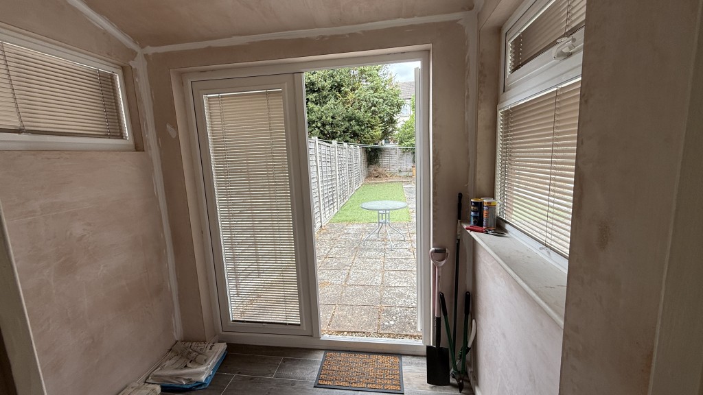 Lot: 174 - END-TERRACE HOUSE REQUIRING REFURBISHMENT - Interior image of extension from dining room